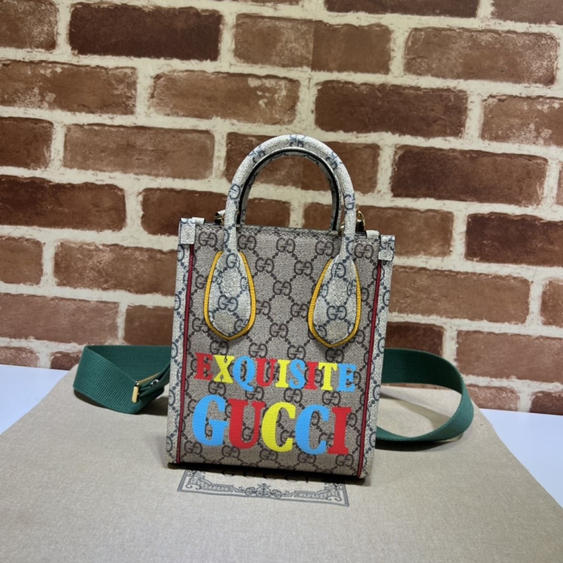 G*u*i top handle bags